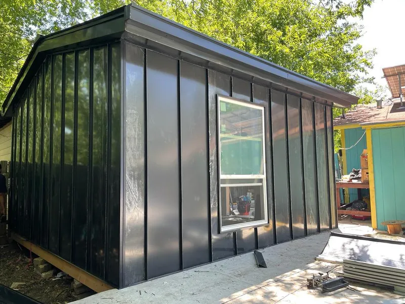 Black standing seam metal wall panels for Metal Roof Installation in Canutillo