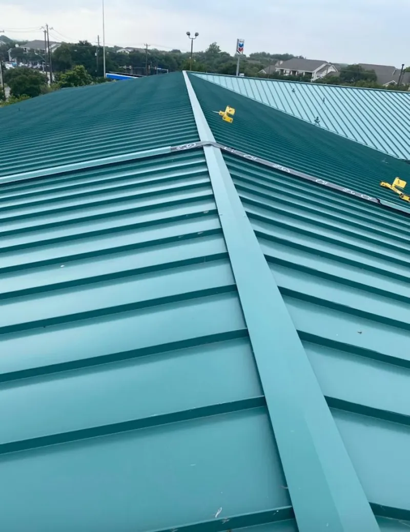 Green commercial metal roof ridge and valley for Metal Roof Repair in Canutillo